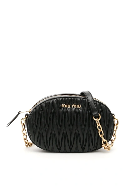 Shop Miu Miu Matelassé Logo Shoulder Bag In Black