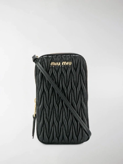 Shop Miu Miu Matelassé Leather Phone Case In Black