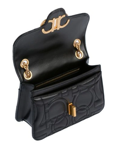 Ferragamo Cross-body Bags In Black