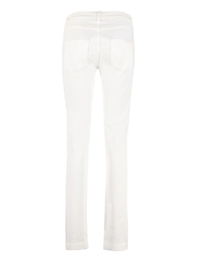 Shop Dolce & Gabbana Embroidered Jeans In White