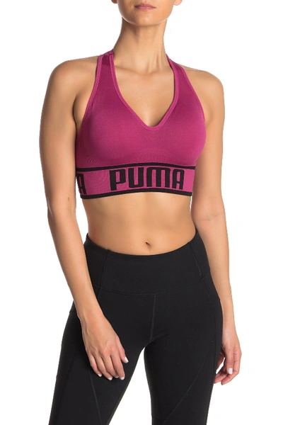 Shop Puma Seamless Apex Sports Bra In Purple Pink