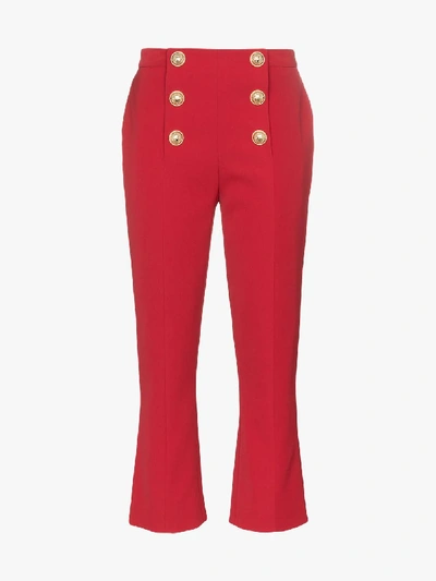 Shop Balmain High Waist Button Detail Trousers In Red