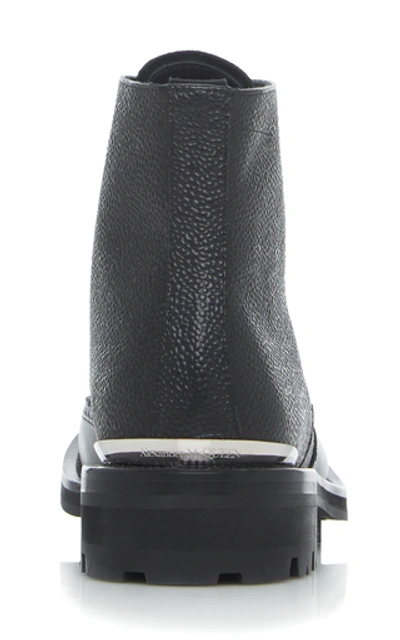 Shop Alexander Mcqueen Textured Leather Brogue Boots In Black