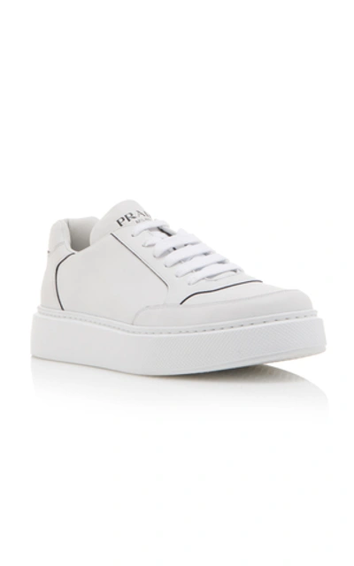 Shop Prada Logo-printed Leather Sneakers In White