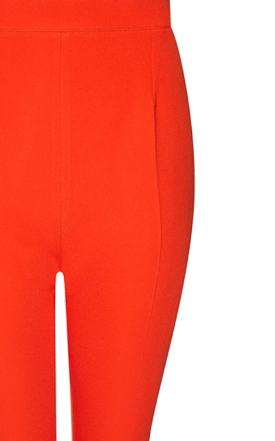 Shop Safiyaa Halluana Crepe Flared Trousers In Orange