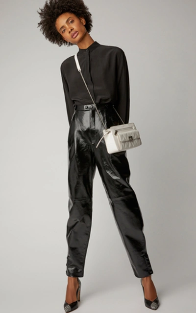 Shop Givenchy Pleated Leather Tapered Pants In Black