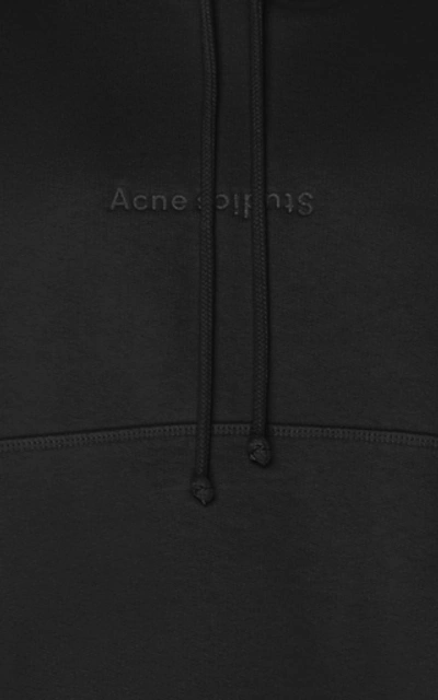 Shop Acne Studios Joghy Logo-embossed Cotton-jersey Hooded Sweatshirt In Black