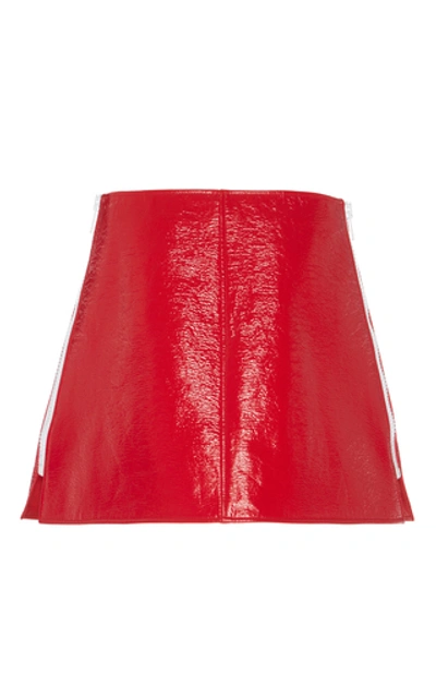 Shop Courrèges Patent-effect Cotton Mini Skirt In Red