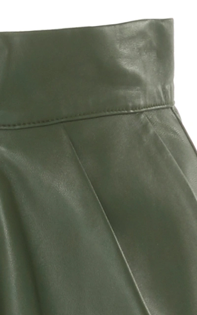 Shop Zeynep Arcay Pleated Leather Mini Shorts In Green