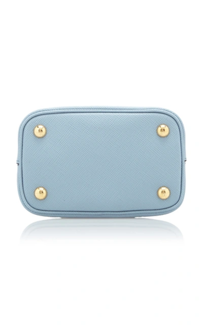 Shop Prada Saffiano Cuir Mini Top Handle Bag In Blue