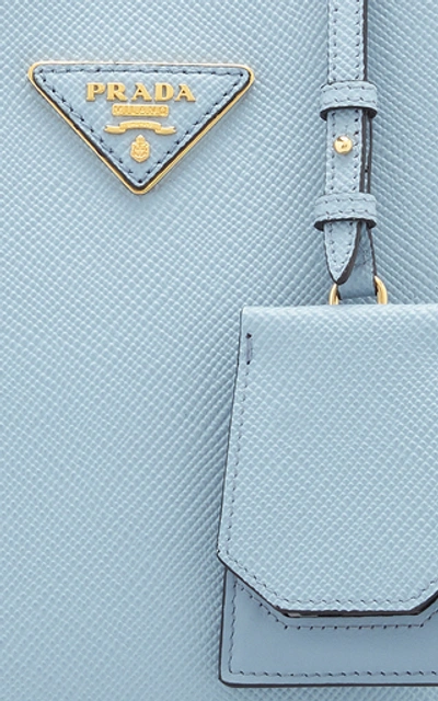 Shop Prada Saffiano Cuir Mini Top Handle Bag In Blue
