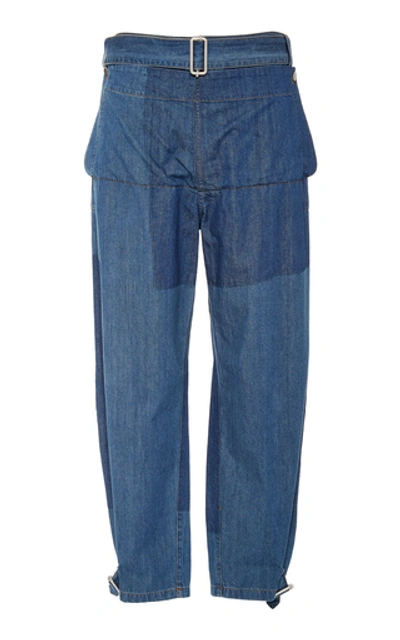 Shop Jw Anderson Belted Fold-front Denim Trousers In Blue