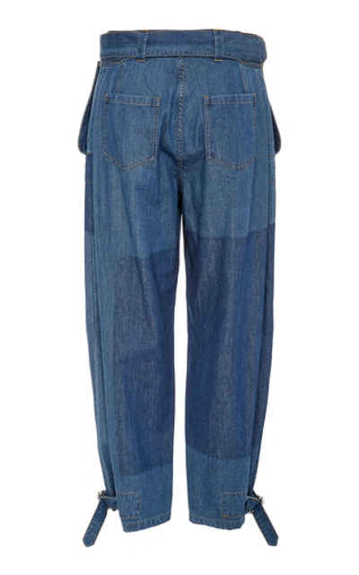 Shop Jw Anderson Belted Fold-front Denim Trousers In Blue