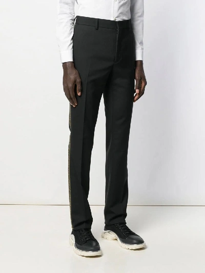 Shop Fendi Ff Monogram Tailored Trousers In Black