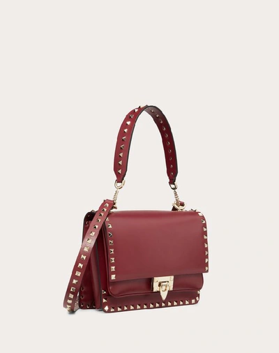 Shop Valentino Garavani Rockstud Smooth Calfskin Crossbody Bag In Cherry