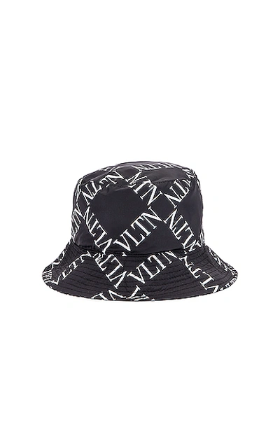 Shop Valentino Print Bucket Hat In Black In Black & White