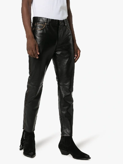 Shop Saint Laurent Slim Leg Leather Trousers In Black