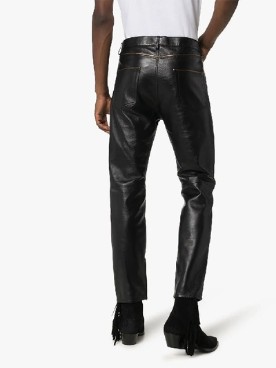 Shop Saint Laurent Slim Leg Leather Trousers In Black