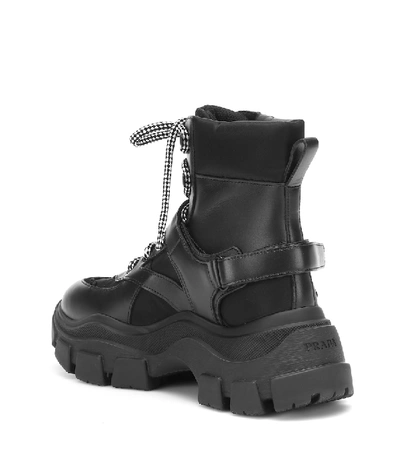 Shop Prada Block Leather Ankle Boots In Black