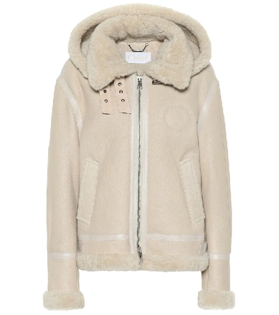 Shop Chloé Hooded Shearling Jacket In Beige