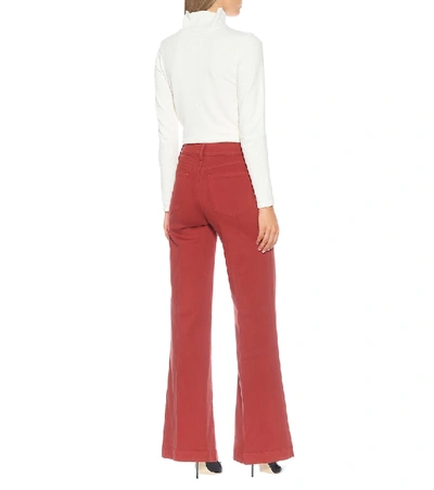 Shop Frame Le Palazzo High-rise Wide-leg Jeans In Red