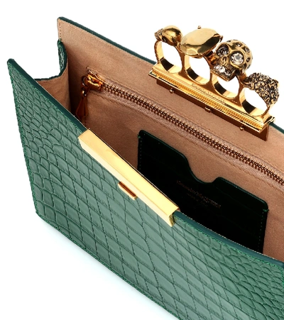 Shop Alexander Mcqueen Four Ring Small Leather Clutch In Green
