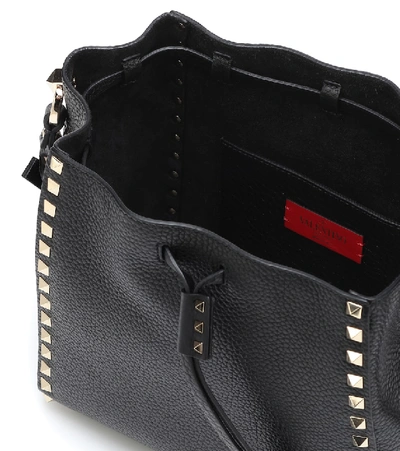 Shop Valentino Rockstud Leather Bucket Bag In Black