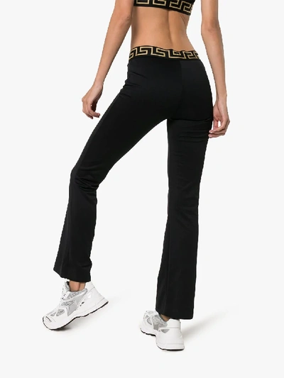 Shop Versace Greca Border Track Pants In Black