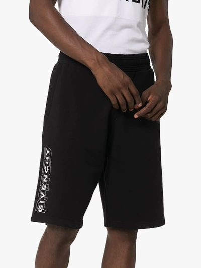 Shop Givenchy Logo Print Shorts In Black