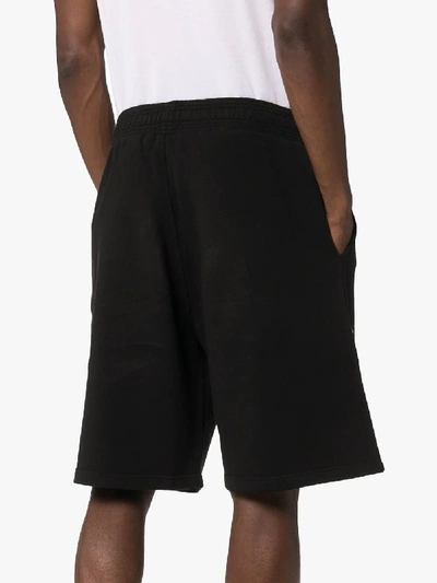 Shop Givenchy Logo Print Shorts In Black