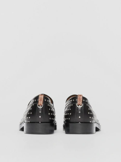 Shop Burberry D-ring Detail Studded Leather Loafers In Black