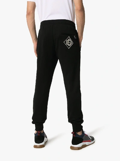 Shop Dolce & Gabbana Dg Logo-embroidered Joggers In Black