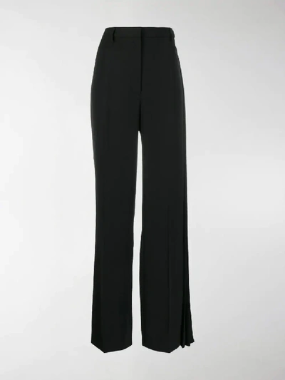 Shop Prada Pleated Detail Trousers In Black