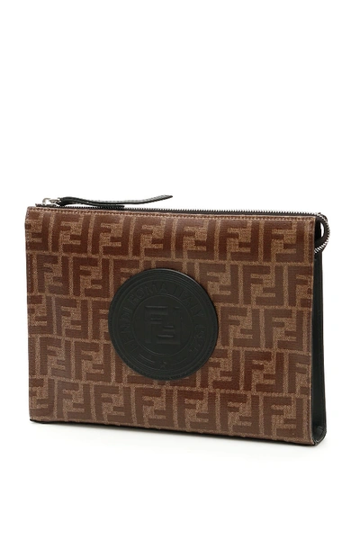 Shop Fendi Logo Monogram Clutch Bag In Brown