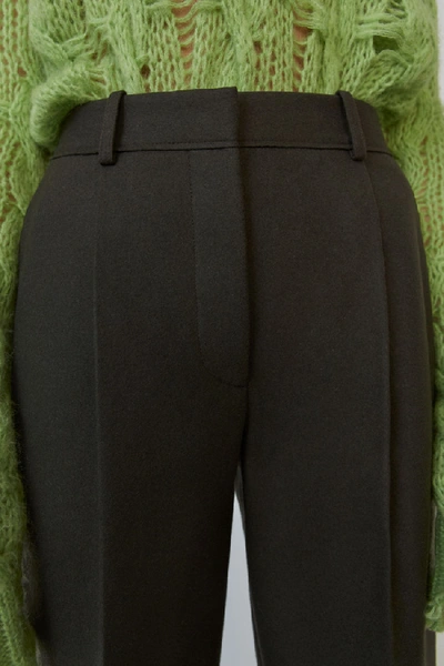 Shop Acne Studios Pleated Trousers Forest Green