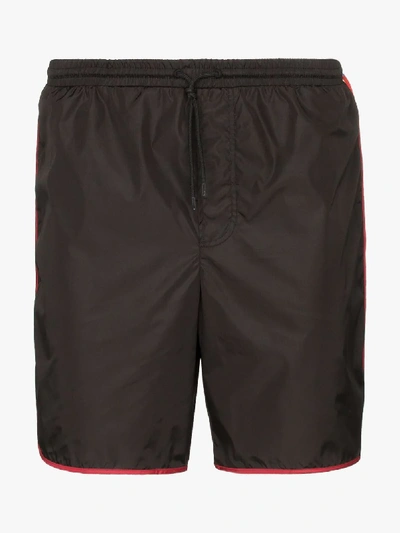 Shop Gucci Gg Logo Stripe Swim Shorts In Black