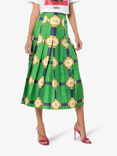 Shop Gucci Printed Logo Pleated Silk Skirt In Green
