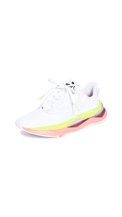 Shop Puma Lqd Cell Shatter Xt Sneakers In  White/pink Alert