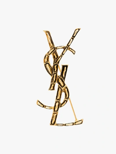 Shop Saint Laurent Gold-tone Opyum Monogram Brooch