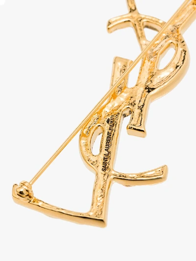 Shop Saint Laurent Gold-tone Opyum Monogram Brooch