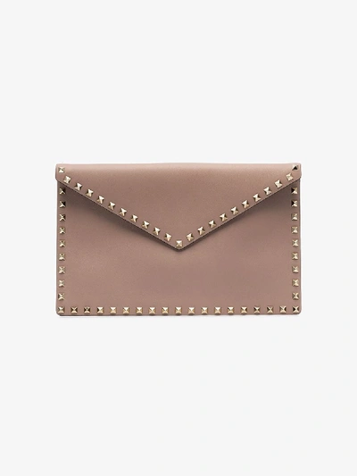 Shop Valentino Pink  Garavani Rockstud Leather Envelope Pouch