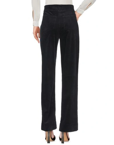 Shop Holzweiler Casual Pants In Black