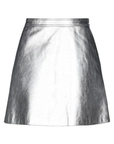 Shop Moschino Mini Skirts In Silver