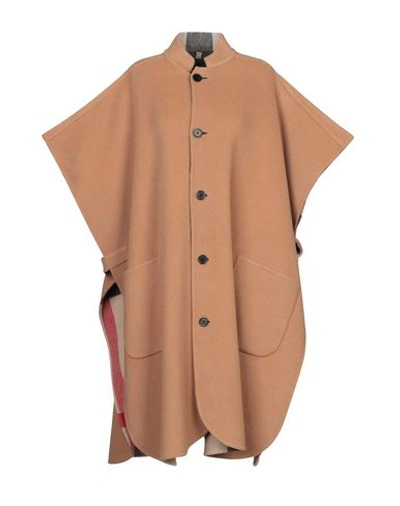 Shop Burberry Cape In Camel