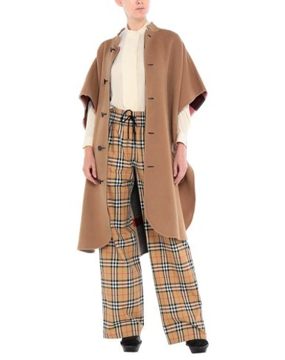 Shop Burberry Cape In Camel