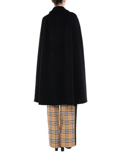 Shop Burberry Cape In Black