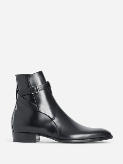 Shop Saint Laurent Boots In Black