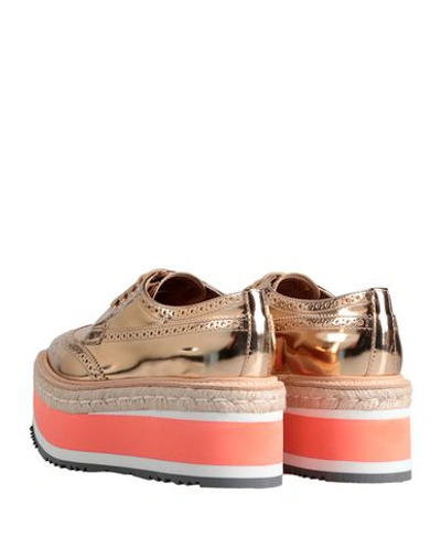 Shop Prada Lace-up Shoes In Gold