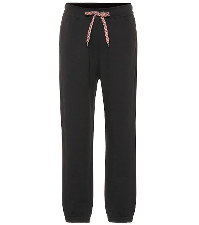 Shop Burberry Cotton-jersey Trackpants In Black