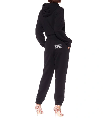 Shop Burberry Cotton-jersey Trackpants In Black